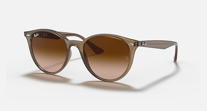 Ray-Ban RB4305 sunglasses with light havana frames and brown gradient lenses