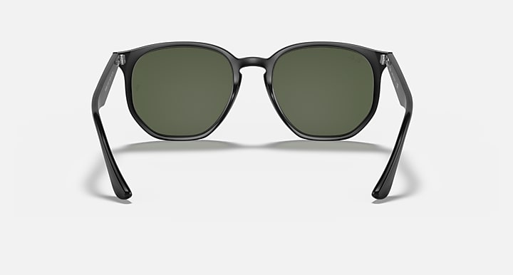 Ray-Ban hexagonal sunglasses with black frame and dark green lenses, front view