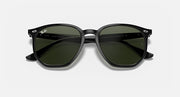 Ray-Ban hexagonal sunglasses with black frame and dark green lenses, top view