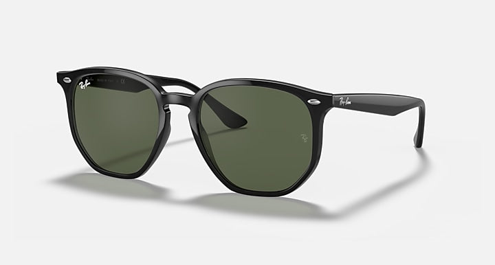 Ray-Ban hexagonal sunglasses with black frame and dark green lenses