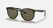 Black hexagonal sunglasses with dark green tinted lenses and angular temples