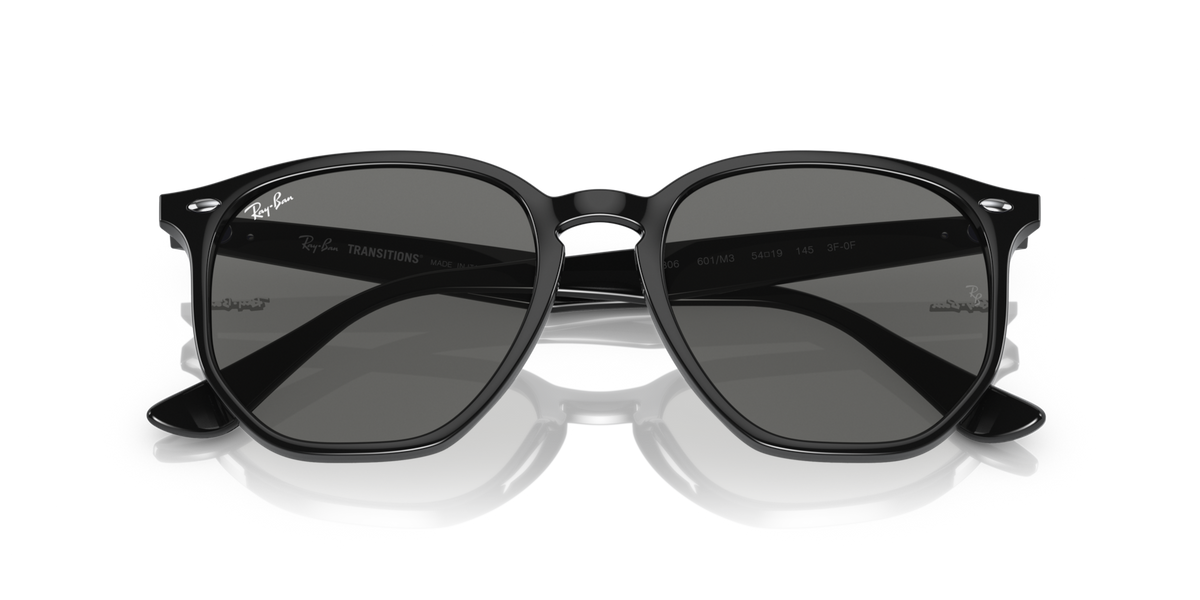 Ray-Ban hexagonal sunglasses with black frame and dark tinted lenses, front view
