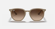 Tan hexagonal sunglasses with gradient brown lenses and thin side arms