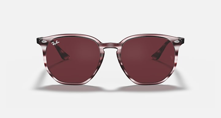 Hexagonal sunglasses front view with burgundy frame and dark maroon lenses