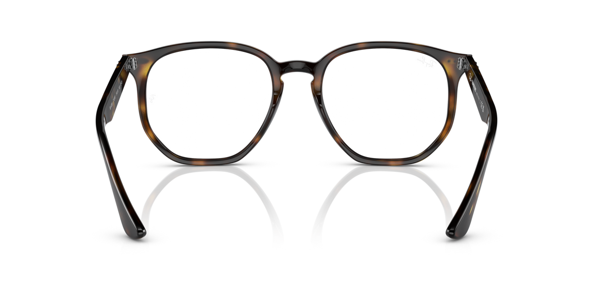 Ray-Ban hexagonal sunglasses with brown tortoise frame and clear lenses, top-down view
