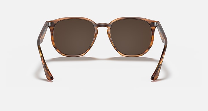 Hexagonal sunglasses front view with light havana frame and dark brown lenses