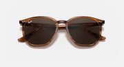 Hexagonal sunglasses front view with dark brown frame and dark lenses