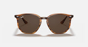 Hexagonal sunglasses with light havana frame and dark brown round lenses