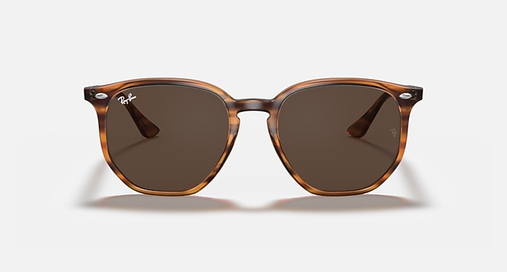 Hexagonal sunglasses with light havana frame and dark brown round lenses