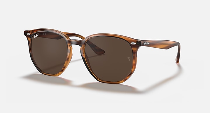 Hexagonal sunglasses with light havana frame and dark brown lenses