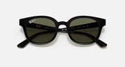 Ray-Ban sunglasses with green-tinted lenses and dark frames, top view