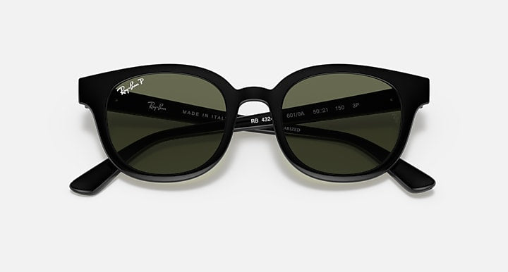 Ray-Ban sunglasses with green-tinted lenses and dark frames, top view
