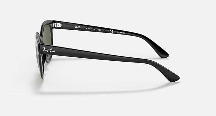 Ray-Ban sunglasses side view with dark frames and green-tinted lens