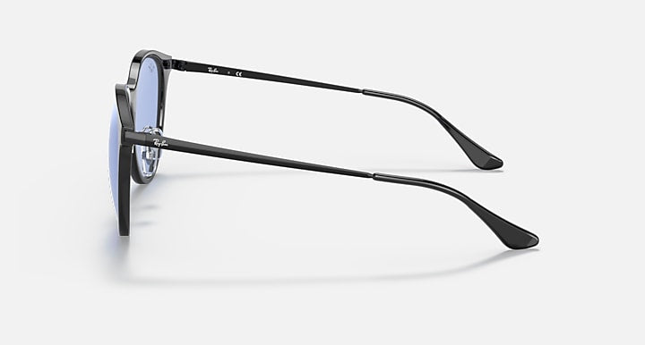 Black sunglasses side view with blue lens and metal temples