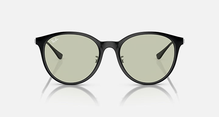 Dark round sunglasses with green-tinted lenses, straight-on front view