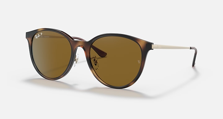 Light Havana round sunglasses with brown lenses and metal arms, front view