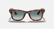 Ray-Ban Wayfarer sunglasses, tortoiseshell frame with blue-tinted gradient lenses, angled