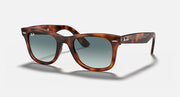 Ray-Ban Wayfarer sunglasses, tortoiseshell frame with blue-tinted gradient lenses