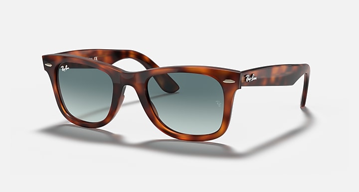 Ray-Ban Wayfarer sunglasses, tortoiseshell frame with blue-tinted gradient lenses