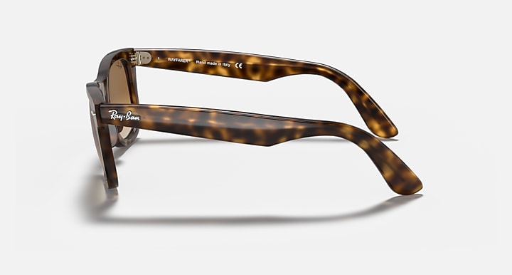 Ray-Ban Wayfarer sunglasses, side view, amber lenses on light Havana frames