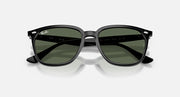 Ray-Ban RB4362 sunglasses with green lenses, black frame, angled front view