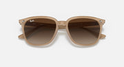 Ray-Ban sunglasses with warm brown frames and dark brown lenses, front view