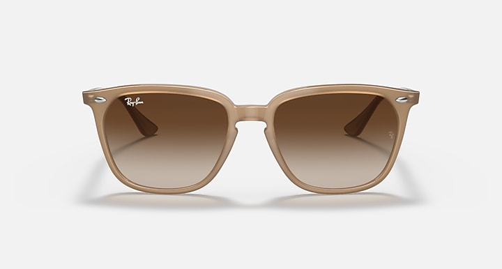 Ray-Ban sunglasses with tan frames and brown gradient lenses, front view