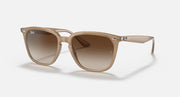 Ray-Ban sunglasses with light brown frames and brown gradient lenses