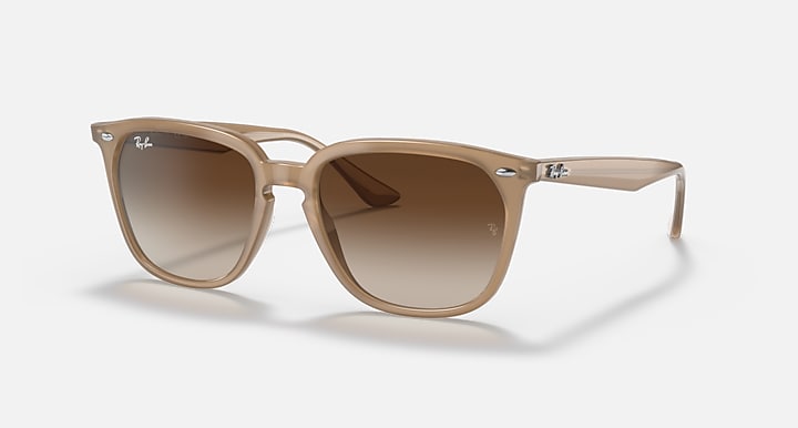 Ray-Ban sunglasses with light brown frames and brown gradient lenses
