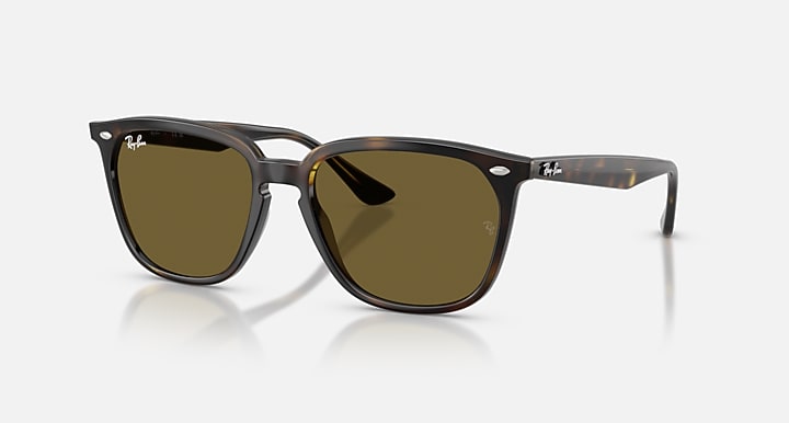 Ray-Ban sunglasses with black frames and olive-tinted lenses, front view
