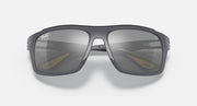 Dark gray aviator-style sunglasses with smoky gray mirrored lenses