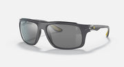 Black aviator-style sunglasses with dark gray lenses and clear side arms