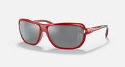 Red aviator sunglasses with dark gray lenses and metal hinges, full frame