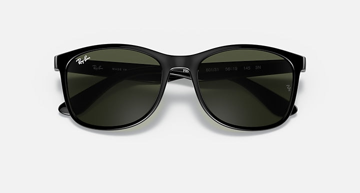 Ray-Ban RB4374 sunglasses with dark frame and dark green lenses, angled view