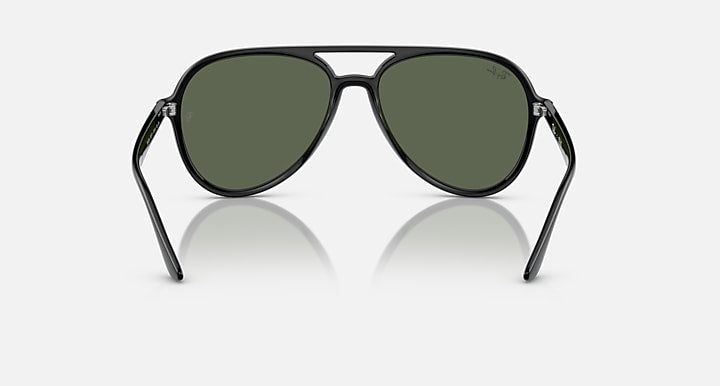 Sunglasses with dark frame and dark green lenses, front view with arm details