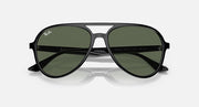 Sunglasses with dark frame and dark green lenses, centered front view