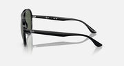 Sunglasses side view with dark arms and dark green lens rims, aviator style