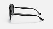 Ray-Ban aviator sunglasses in black with wrap-style arms and hinge details.
