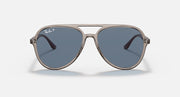 Ray-Ban aviator sunglasses with opal-look frame and blue-tinted lenses.