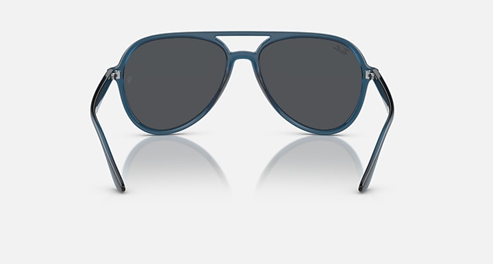 Ray-Ban aviator sunglasses with dark gray lenses and blue frame, front view.