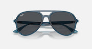 Ray-Ban aviator sunglasses with dark gray lenses and blue frame, wide front angle.