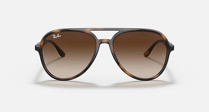 Sunglasses with havana frame and brown gradient lens fronts, aviator shape