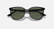 Black frame sunglasses angled view with olive-green tinted lenses
