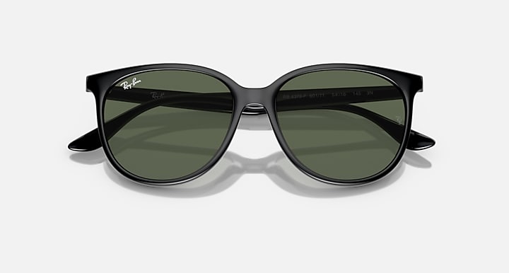 Black frame sunglasses angled view with olive-green tinted lenses