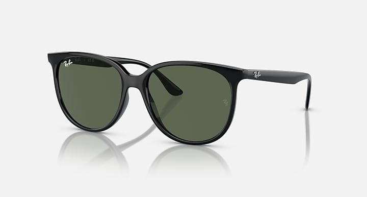 Black frame sunglasses with olive-green lenses and rounded silhouette