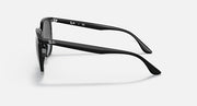 Black sunglasses side view with curved temples and dark tinted lenses