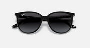 Black cat-eye sunglasses with dark lenses and angled top rim