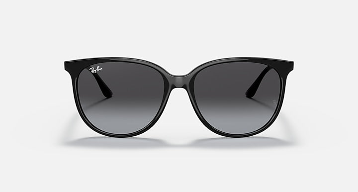 Black cat-eye sunglasses with dark lenses and Ray-Ban logo on temple