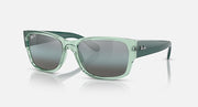 Ray-Ban RB4388 rectangular sunglasses with transparent green frame and dark tinted lenses