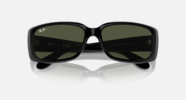 Ray-Ban sunglasses with dark lenses in black frames, front view.